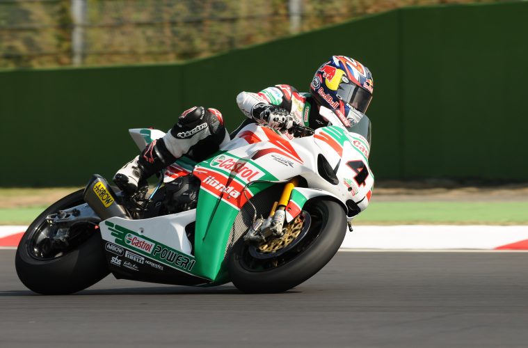 Image of Moto racer with Castrol logo on bike to reference the company's new product forecasting and demand planning. techniques