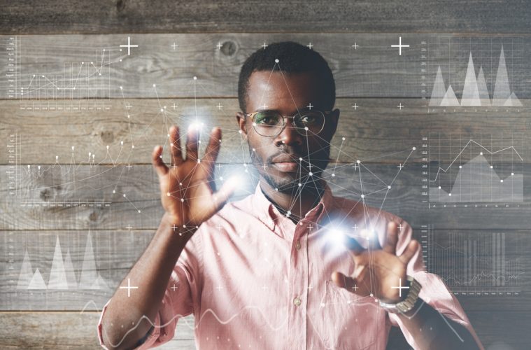 man in shirt surrounded by data science imagery